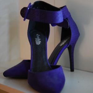 Strap high heel shoe
